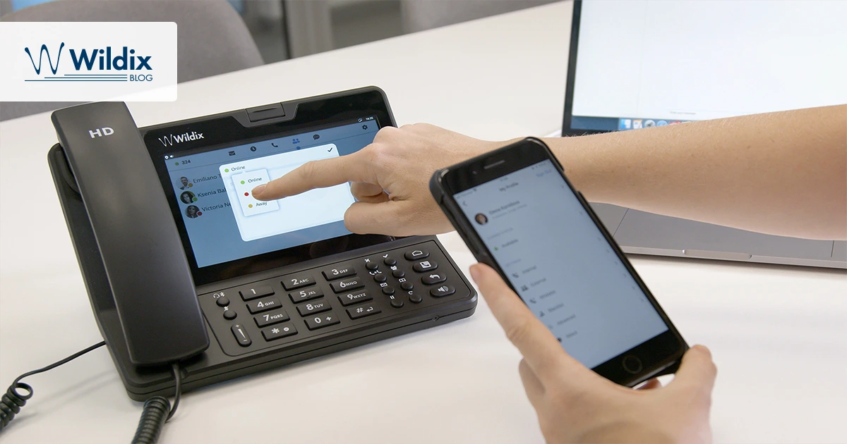 Even if you’re using a broadband phone connection, you’ve probably already heard a little about the benefits of VoIP phone systems. Because as things are, VoIP is growing so immensely popular that it’s easily overtaking landline connections in terms of user base. As of 2022, VoIP is a $40 billion industry, and by 2026 its value is expected to grow to $53.5 billion. Compared to the current $8.28 billion value of landline telephony worldwide, it’s clear this technology is far and away on the way up, to the point that for millions, the advantages of VoIP make it totally eclipse a traditional PBX. Still, changing to a VoIP setup probably feels like a big step for your business, and a big investment. Even if you’ve heard vaguely about the advantages of VoIP compared to your broadband PBX, jumping off that old reliable technology into the internet can easily be intimidating. But the fact is that, compared to analog connections, the benefits of VoIP for businesses make switching a total no-brainer. Even once you’ve considered both the pros and cons of VoIP telephony, there’s not much reason to stay anchored to your old analog line. To give an overview of the biggest VoIP features and benefits, we’ve created this easy list of advantages and disadvantages of VoIP telephony from a business perspective. What Is VoIP? “VoIP” is short for “voice over internet protocol” or “voice over IP.” That just means that rather than relaying voice calls over an analog connection, a Voice over IP system relays calls over the internet. When this technology was created in the late 1990s, the benefits of VoIP were more limited due to slower connections and the industry’s lack of maturity. But with 20 years of development, advancements to VoIP features and benefits have made the technology go far beyond its original novelty of placing phone calls over your computer. Now, the benefits of VoIP for businesses make these systems a must-have. Benefits of VoIP Today, there are countless benefits of a VoIP phone system, to the point that most businesses would have a hard time going back to a plain-old telephone solution. Here are just a few of the main benefits of voice over IP telephony. Lower Costs Easily the biggest benefit of VoIP for businesses is its lower operational expense. VoIP is typically charged at a monthly per-user rate, and because it makes phone calls over your current internet connection, providers can almost always undercut the monthly fee of most broadband phone lines. Better still, VoIP providers rarely charge installation fees, so the immediate switch won’t even cost you an up-front investment. Mobility Since it runs entirely off an internet connection, VoIP benefits from giving users remote access to their PBX and their main office number via any internet connection, whether that’s via laptop, tablet or smartphone. This opens up the potential for smart working, making VoIP a must-have for organizations seeking to modernize their work model. Flexibility Instead of waiting hours for physical infrastructure to be changed, as you would with analog telephony, VoIP enables you to make changes to license types, integrations, user details and more right away, usually without even needing a technician on site. Scalability Unlike with analog telephony, adding or removing users on a VoIP system takes a matter of minutes, because making that change is just a matter of editing your PBX’s software settings. You can even connect users to your digital PBX from a different location, so it’s just as easy to connect branch offices or even remote freelancers directly to your main phone system. Integrations Keeping with the philosophy of Unified Communications, VoIP phone systems integrate with multiple other pieces of software. Some of the most popular examples are click-to-call, voicemails delivered via email and even syncing contacts and conversations from your CRM. Analytics One of the most obvious benefits of a VoIP phone system is that, as computer software, it can track, record and even analyze call data. That gives you instant access to a treasure trove of information, including call length, call purpose, IVR inputs and more. For organizations with contact centers or other call-heavy departments in particular, this benefit of VoIP on its own makes it worth switching to. Advanced Features When your phone system works through the internet, you’re always just a click away from advanced features like video, link and document sharing, chat, synced contact lists and call recording. Thanks to how much business efficiency they add, these are some of the most highlighted benefits of VoIP for business purposes. Drawbacks of VoIP Unfortunately, the advantages of VoIP do come with a set of disadvantages. There aren’t that many when compared to benefits of VoIP for business needs, but no overview of VoIP in comparison to analog telephony would be complete without them. Internet-Dependent Like its name suggests, a Voice over IP system only works if it’s using the internet. Because of that, you’ll need a powerful internet connection to use this system at an office, especially if that one connection has to support multiple users. Any lag on that connection can create jitter or even drop calls if the system isn’t configured well enough. If your connection is a concern, talk to your VoIP provider about how to configure a VoIP system specifically for lower speeds. Downtime Although VoIP on the whole has a great record of uptime, analog telephony still has a slight edge on reliability thanks to its use of a dedicated line. Avoid this by looking for a provider with a high record of uptime, especially by using failover servers. These backups work much like an emergency power generator, automatically turning on when the main server fails to keep your system going as normal. Without that degree of protection, you may just enjoy fewer benefits of VoIP and see more of its disadvantages. Emergency Calls These days, most countries require location data to be included in outgoing emergency calls. However, this practice — called Enhanced 911/112, or simply E911/E112 — is harder to implement on VoIP phone systems, as unlike landlines they don’t provide location data by default. Fortunately, solutions like Wildix include simple guides to E911/E112 setup to ensure your VoIP system is legally compliant. Is VoIP Right for My Business? Almost certainly, it is. To recap, when you take advantage of the benefits of VoIP, you’ll get: Lower costs Mobility Flexibility Scalability Integrations Analytics Advanced features Of course there are a handful of drawbacks to a VoIP phone system, and when weighing both the pros and cons of VoIP you may find this technology isn’t a good fit for you. In particular, organizations with slow or limited internet connections may still be better off with a landline connection for now. Others may benefit from using an analog line alongside VoIP as a backup way of taking calls. However, remember that one of the biggest VoIP benefits is that it effectively does everything that traditional telephony can — it just also does a lot more than traditional phones can, too, and always at a lower cost. Even at a glance, the basic ease of using your office number from any internet connection on earth means the benefits of Voice over IP systems put them far ahead of their analog alternatives. Combine that with added benefits and lower costs, and it’s easy to see why for millions, VoIP has fully replaced analog telephony at their business. And if it sounds like a stretch to call analog systems obsolete, consider that the UK and Spain will switch off their copper connections by 2025, with plenty others following suit later. Looking at the full advantages and disadvantages of VoIP, it’s not so much a question of if VoIP will fully overtake analog systems — it’s a question of when. If you’re looking to switch to VoIP with a purpose-built solution that’s 100% secure by design, Wildix may be a good fit for your business. Discover more about what a Wildix phone system delivers to businesses.