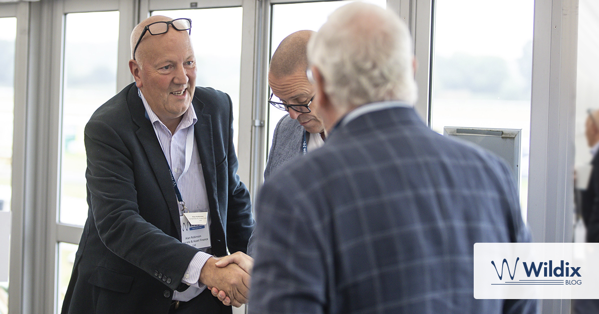 Business partners shaking hands in the office